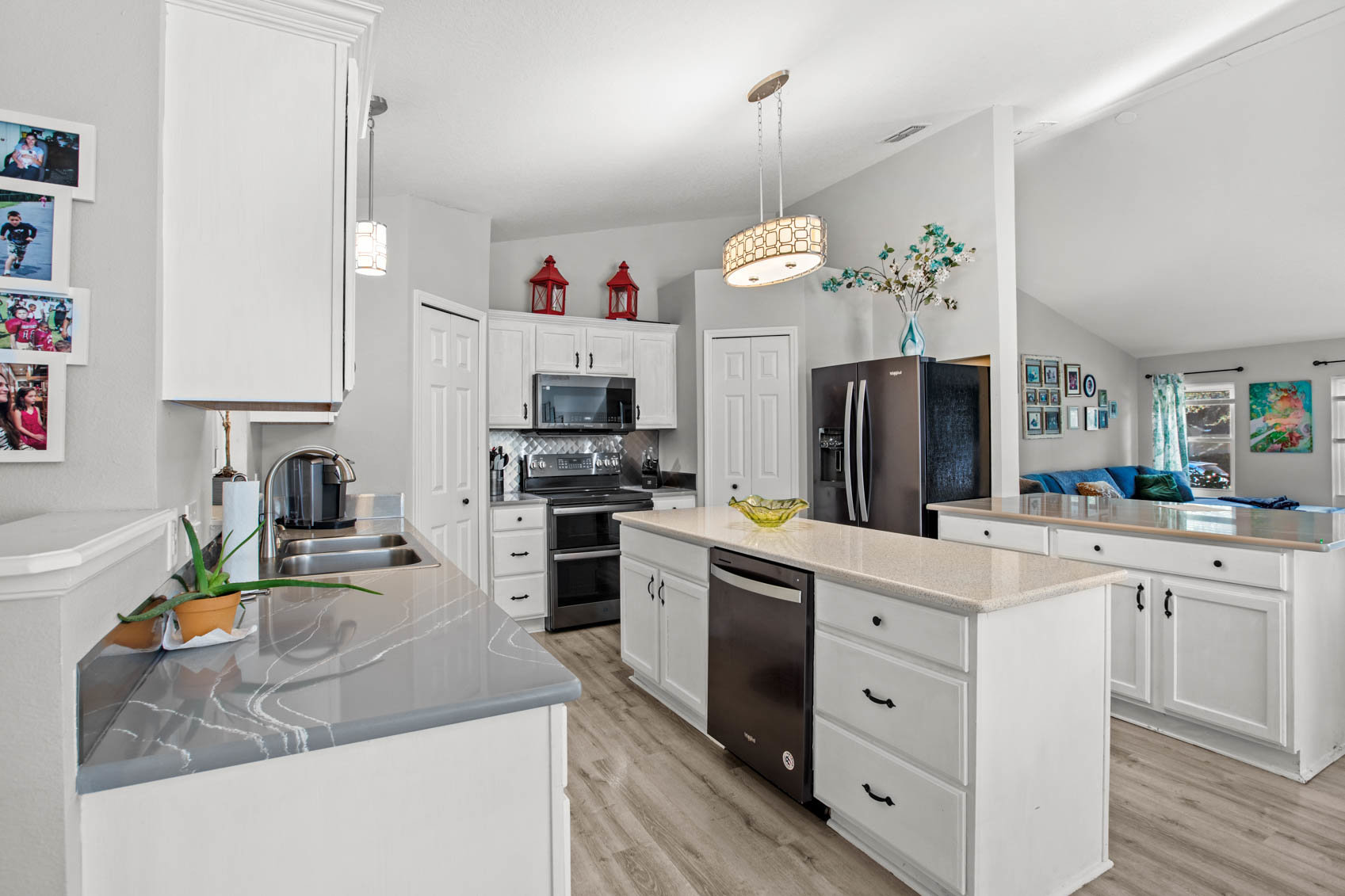 kitchen with island and white cabinets